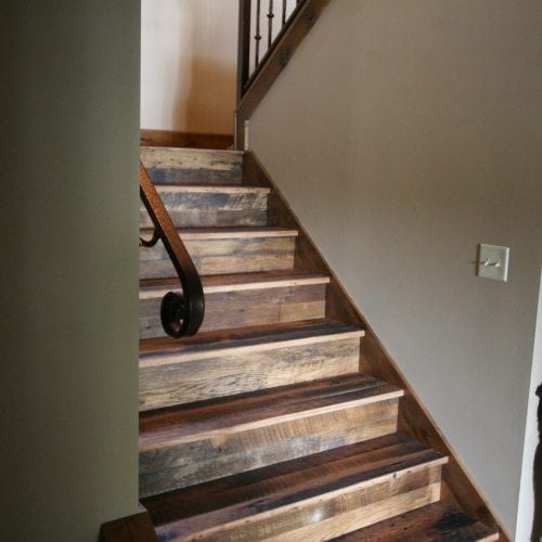 reclaimed wood stairs in house new construction lake ozark missouri